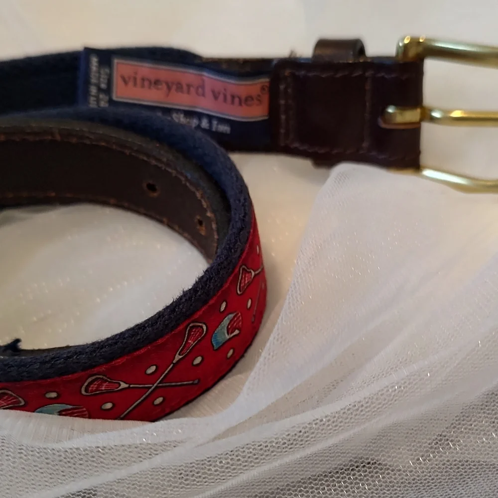 Vineyard vines by Shep Ian size 24 lacrosse red and Navy belt.
